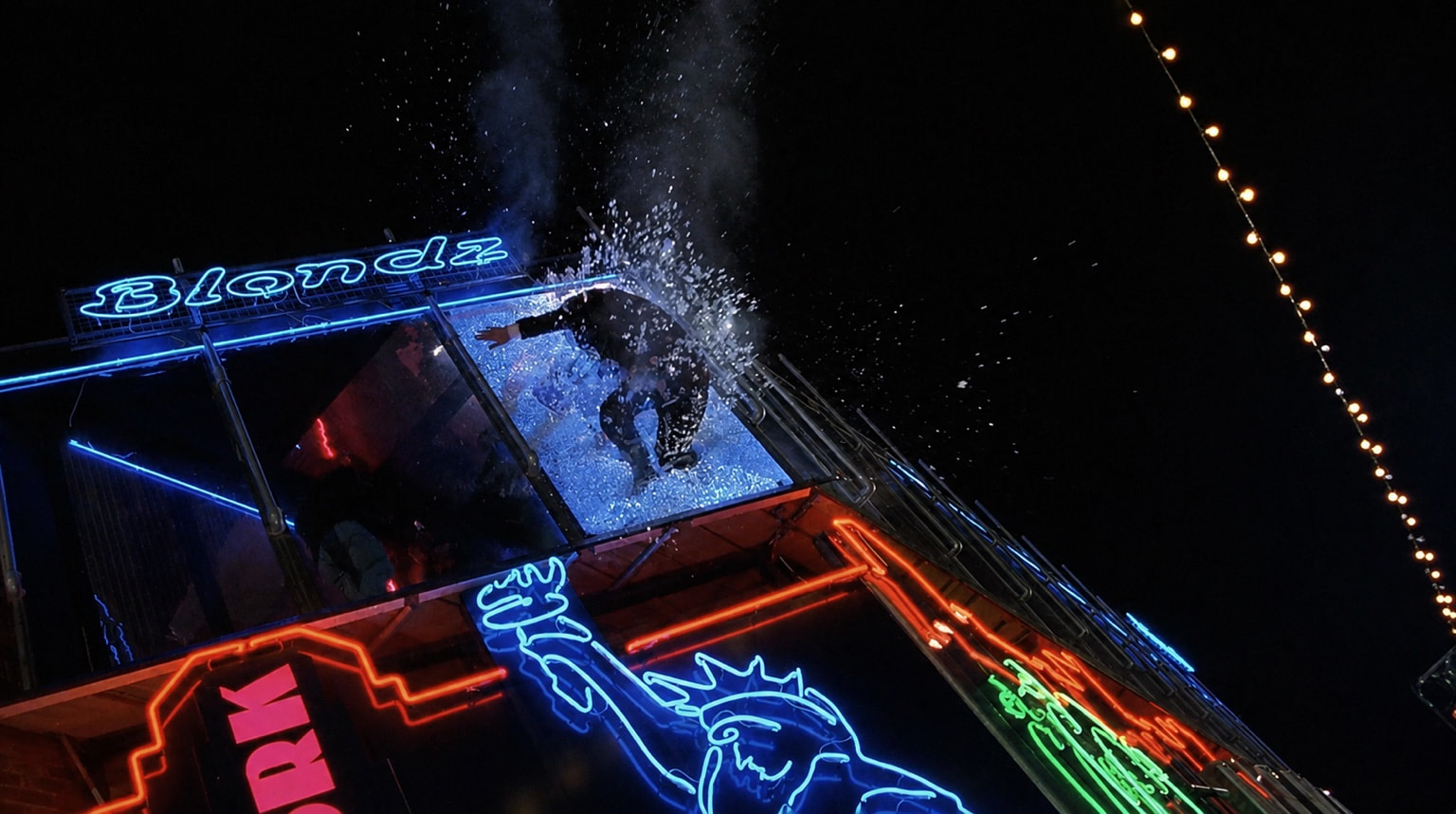 A stunt performer crashing through a high window in a shower of glass — Essex Boys