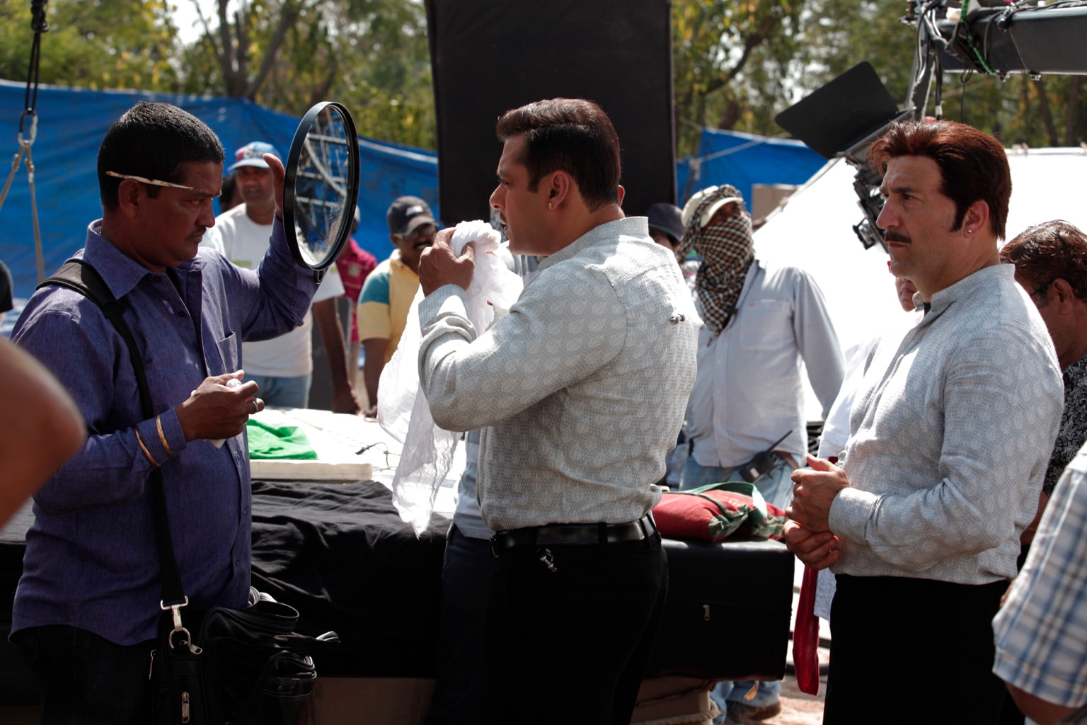 Performers preparing costume work