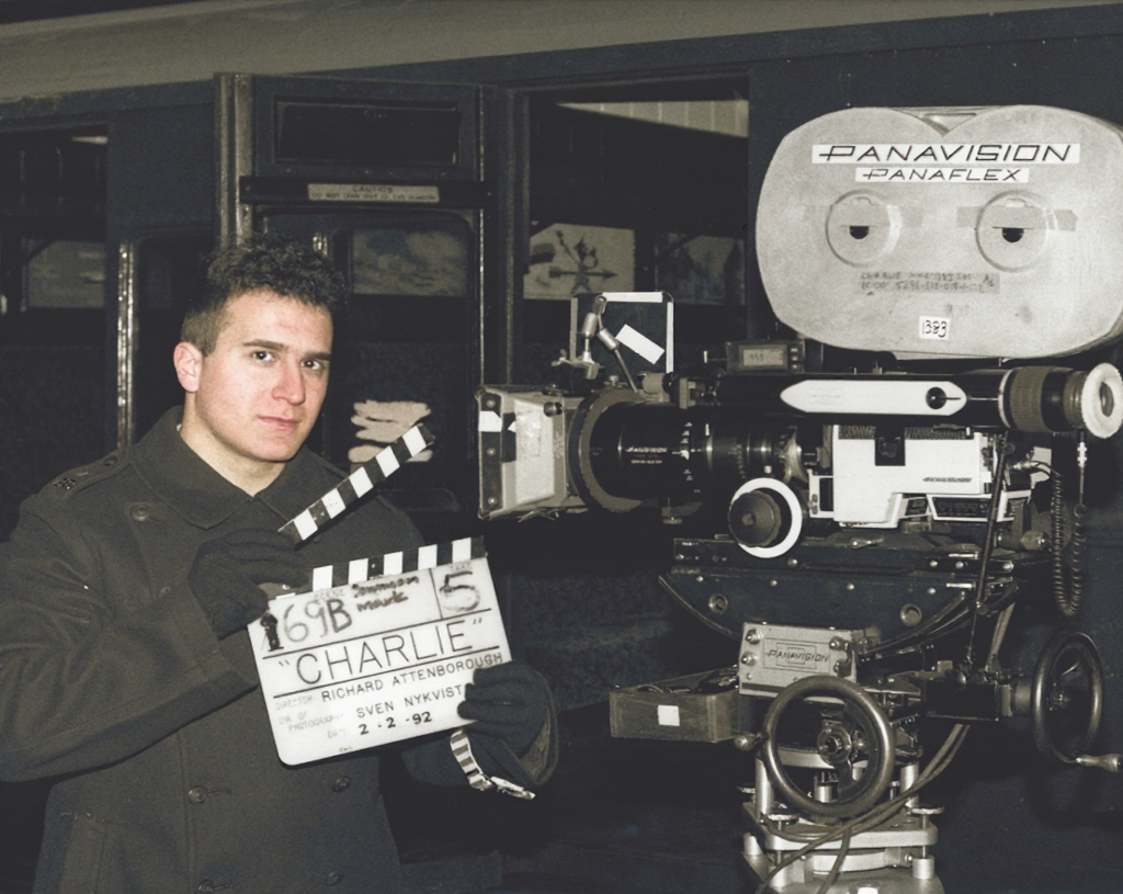 Peter Pedrero with a film camera and clapperboard — Chaplin