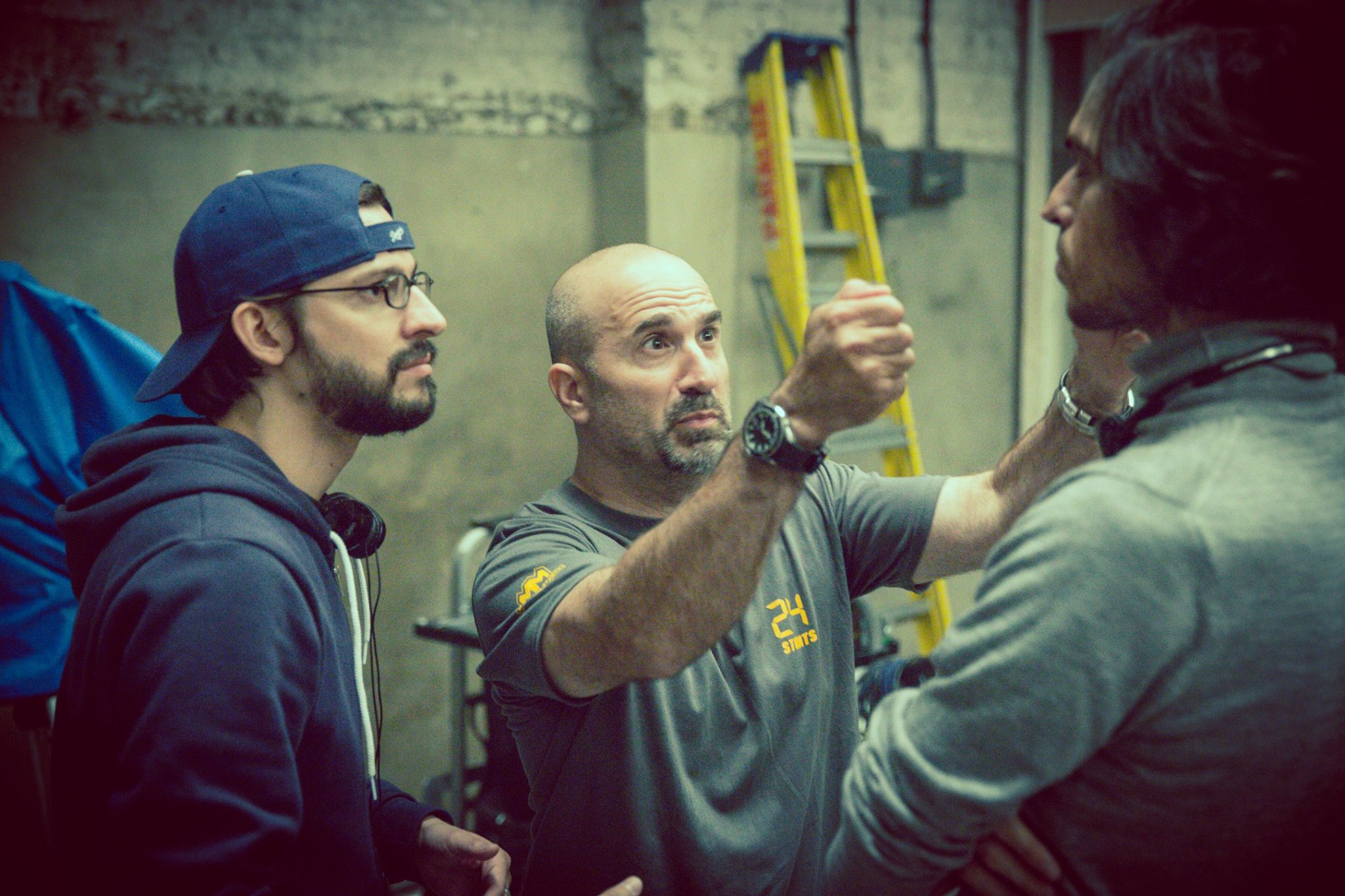 Peter Pedrero discussing an action setup with the directors — Don’t Hang Up