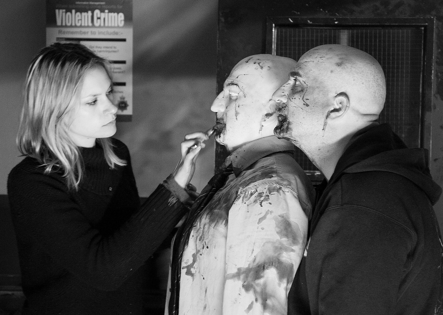A makeup artist applying prosthetic effects to Peter Pedrero — Frightfest: Assault on Sun Hill