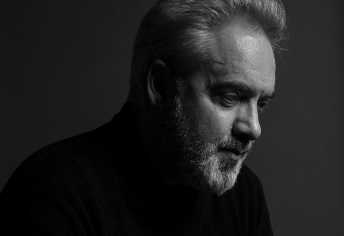 Black-and-white photograph of Sam Mendes