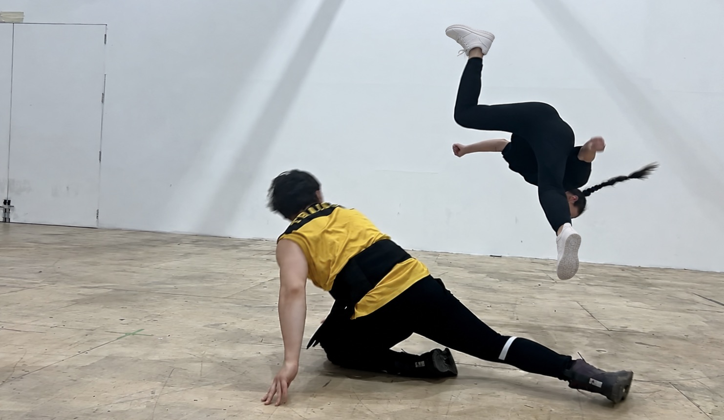 Danger Zone rehearsal — aerial flip with white trainers